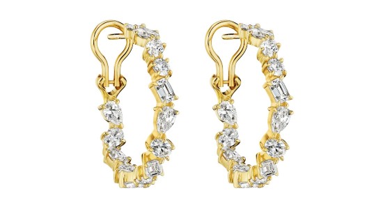 A yellow gold pair hoop earrings featuring diamonds of a number of different cuts, available at Wilson & Son Jewelers.