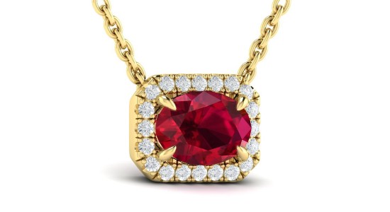 A yellow gold Vlora pendant necklace featuring a halo set, oval cut ruby, available at Wilson & Son Jewelers.