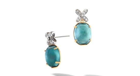 A pair of mixed metal blue topaz stud earrings from Marco Bicego, available at Wilson & Son Jewelers.