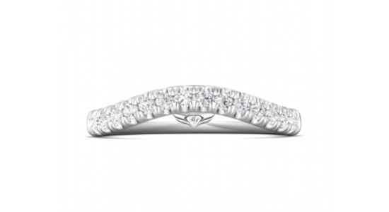 A curved wedding band set with diamonds, available at Wilson & Son Jewelers.