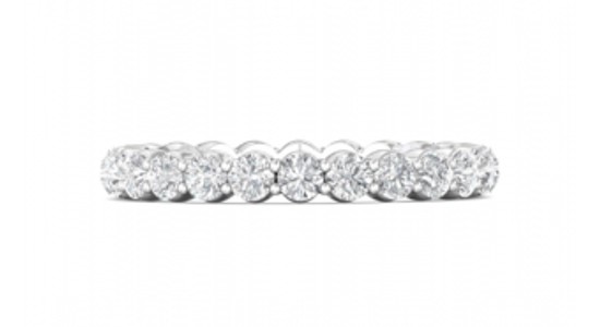 A white gold diamond eternity wedding band, available at Wilson & Son Jewelers.